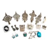 A QUANTITY OF ETHNIC JEWELLERY Including five white metal stylised crosses, possibly Ethiopian,