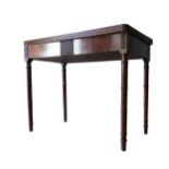 A 19TH CENTURY MAHOGANY FOLDING TEA TABLE, the folding over fluted edge top supported by four turned