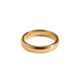 A 22CT GOLD BAND RING, with rounded edge shank, weight 6.2 grams. Marked 22ct. Size O.