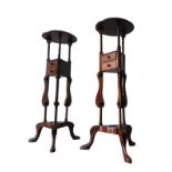 A PAIR OF GEORGE III STYLE MAHOGANY 'WASH STANDS', or plant stands, with barley twist decoration,