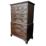 A GEORGE III MAHOGANY CHEST ON CHEST, the top section comprising of two short drawers over three