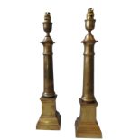 A PAIR OF CONTEMPORARY BRASS TABLE LAMPS, in a Roman pillar style, 50 cm high