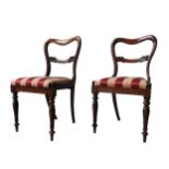 A SET OF SIX MAHOGANY YOKE BACK DINING CHAIRS, and two very near matching yoke back chairs, all