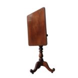 A VICTORIAN MAHOGANY TILT TOP TRIPOD TABLE