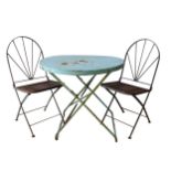 A VINTAGE DISTRESSED STEEL FOLDING BISTRO TABLE WITH TWO CAST-IRON FOLDING CHAIRS, the table painted