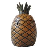 A 20TH CENTURY TREEN TEA CADDY, in the form of a pineapple, 20 cm high Provenance :