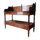 A 19TH CENTURY MAHOGANY 'DOUBLE WIDTH' WASH STAND, the top tier with two wash bowl recesses atop