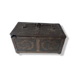 A 17TH CENTURY WROUGHT IRON TABLE CASKET, probably Continental, the swing handle with central double