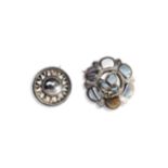 TWO EARLY 20TH CENTURY BROOCHES An agate set Victorian white metal brooch width 41mm and domed