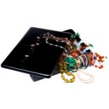 A QUANTITY OF JEWELLERY Including a four amber necklaces and two pairs of amber earrings. along with