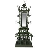 A LARGE CAST-IRON 20TH CENTURY HALL STAND, with ornate pierced back panels, foliate and scroll