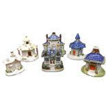 A VICTORIAN STAFFORDHIRE PASTILLE BURNER IN THE FORM OF A COTTAGE AND AND FIVE OTHERS. 15 cms max.