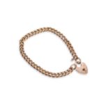 A 9CT GOLD TRACE CHAIN BRACELET, with heart shaped padlock clasp. Marked 9ct  Weight 4 grams