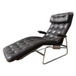 A 'FENIX' LOUNGE CHAIR BY SAM LARSSON FOR DUX, circa 1970, chromed metal and canvas with