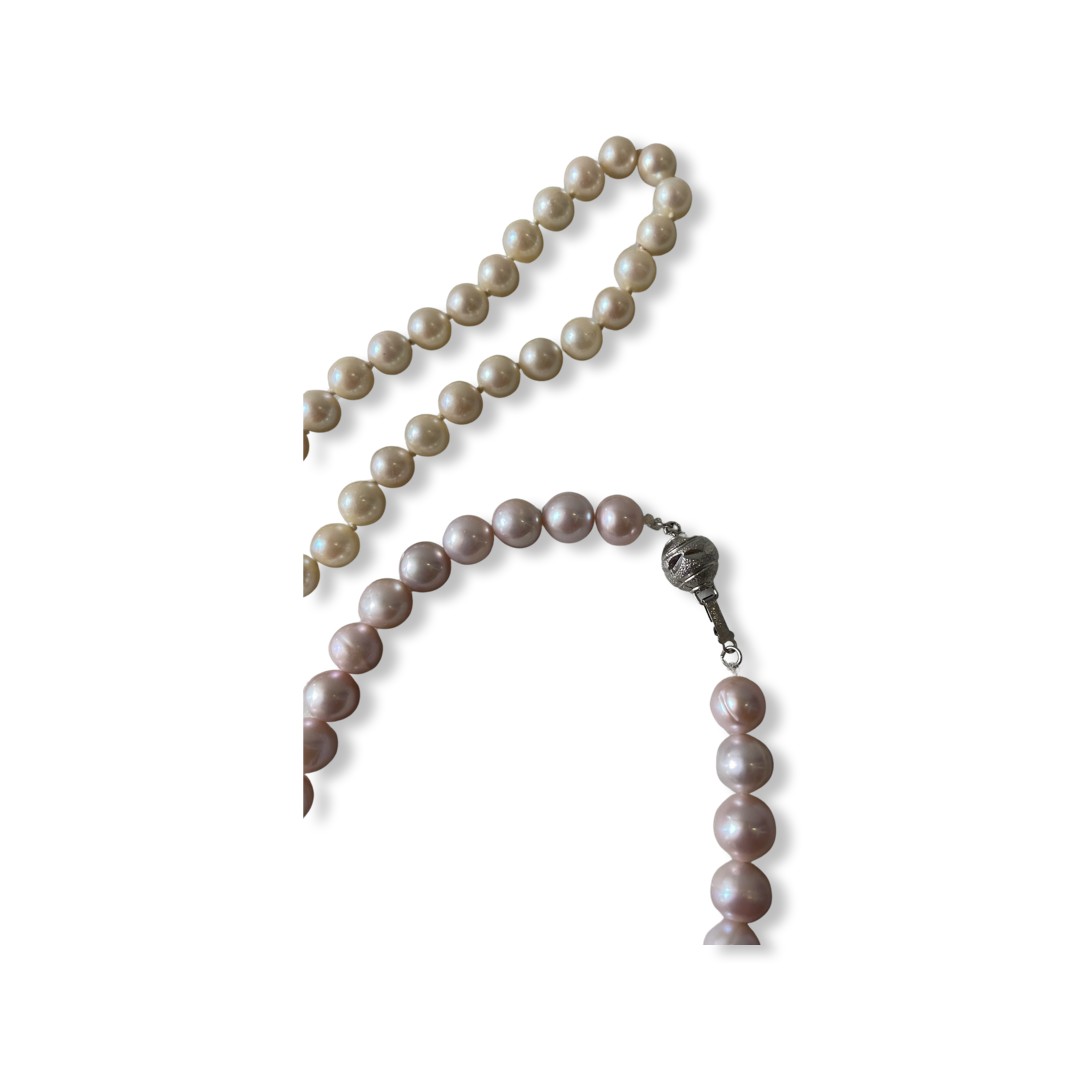 TWO CULTURED PEARL NECKLACES One pink cultured pearl necklace, eack pearl measures 10mm across. - Image 2 of 2