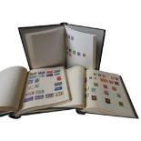 A COLLECTION OF THREE STAMP ALBUMS INCLUDING A VICTORIAN PENNY RED AND OTHERS