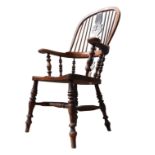 A 19TH CENTURY WINDSOR CHAIR, with shaped pierced splats and baluster turned supports, the saddle