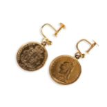 A PAIR OF HALF SOVEREIGN EARRINGS In yellow metal screw back fitting, stamped 9ct. One sovereign