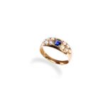 AN 18CT PEARL AND SAPPHIRE RING set with five half pearls in closed-back setting, between an old