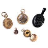A COLLECTION OF 19TH CENTURY LOCKETS A carved gilt mourning locket with hair and gold wire work in