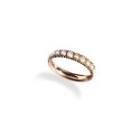 AN EARLY VICTORIAN HALF PEARL ETERNITY RING closed back setting. Size M. Weight 1.6gms. Unmarked.