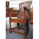 A CHARLES I CARVED OAK ARMCHAIR, circa 1640