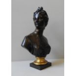 AFTER J.A HOUDEN, A BRONZE BUST OF DIANA THE HUNTRESS, signed, on a square base, 47 cm high