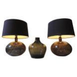 A PAIR OF CONTEMPORARY TINTED GLASS TABLE LAMPS AND MATCHING BOTTLE VASE, both lamps with a dimmer