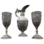 AN EDWARDIAN SILVER 'CELLINI' CLARET JUG AND A PAIR OF MATCHING GOBLETS, circa 1901, by Charles