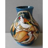 A MODERN MOORCROFT VASE BY VICKY LOVATT, depicting finches and tits amongst foliage