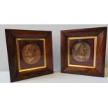 A PAIR OF ROSEWOOD FRAMED GILT METAL PORTRAIT PANELS, late 19th century, depicting Roman emperors