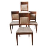 A SET OF FOUR CONTINENTAL DINING CHAIRS,  the back frieze panels decorated with floral lozenge