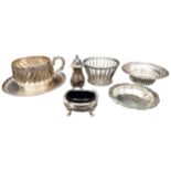 A CONTINENTAL WHITE METAL CUP AND SAUCER, along with a continental white metal basket, two silver
