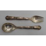 A GEORG JENSEN STERLING SILVER PATTERN 57 SALAD SERVING SET, comprising of serving spoon and serving