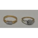 TWO 9CT GOLD RINGS A vintage ring set with diamond chips in a floral cluster. Head measures 7.5mm