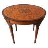 A REGENCY WALNUT AND MAHOGANY CROSS BANDED OVAL LAMP TABLE, the marquetry top inlaid with ornate