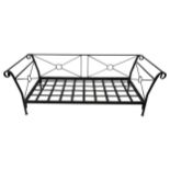 A CONTEMPORARY CAST-IRON DAY BED FRAME, with scroll arms and a lattice strap base, 80 x 235 x 90 cm