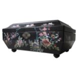 A LAQUERED MOTHER OF PEARL INSET JEWELLERY BOX, of sarcophagus form, decorated with birds and
