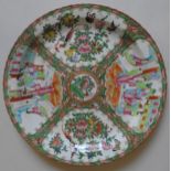 A CHINESE FAMILLE ROSE DISH, with central rose medallion and four panels depicting courtiers scene