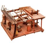 A CROSS-SECTIONAL MODEL OF AN 18TH CENTURY NAVAL GUN DECK kit built with two brass cannons. 15 x