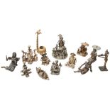 A COLLECTION OF ASHANTI BRONZE FIGURAL GROUPS gold weights and other items. 20th century PROVENANCE: