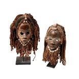 A DAN MASK FROM THE IVORY COAST patinated coloured finish and woven rope, canvas and cowrie shell