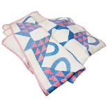 AN AMERICAN HANDMADE QUILT Quilt the compartmental design with arcs and triangles in pink and blue