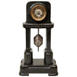 A CONTINENTAL ART DECO SERPENTINE FOUR PILASTER MANTEL CLOCK C1920, the brass dial with stylised