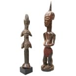 AN UNUSUAL SONGYE POWER FIGURE and a Yoruba Shango four-face figure. 45 cms max PROVENANCE: The