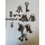 A GEORGIAN STEEL KEY WITH REMOVABLE PIN and finely notched bit, two interesting ‘spade’ shaped