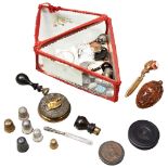 A VICTORIAN COQUILLA NUT POMANDA/SEWING CASE various silver thimbles, a hunting dog whist marker,
