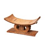 A VINTAGE ASHANTI CARVED WOODEN STOOL FROM GHANA 16 x 31 x 17 cms PROVENANCE: The David