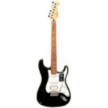 A FENDER PLAYER STRATOCASTER HSS in black with rosewood fretboard, tremolo arm, fender strap and