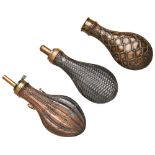 A 20TH CENTURY COPPER AND BRASS POWDER FLASK embossed with a faux basket weave exterior, another